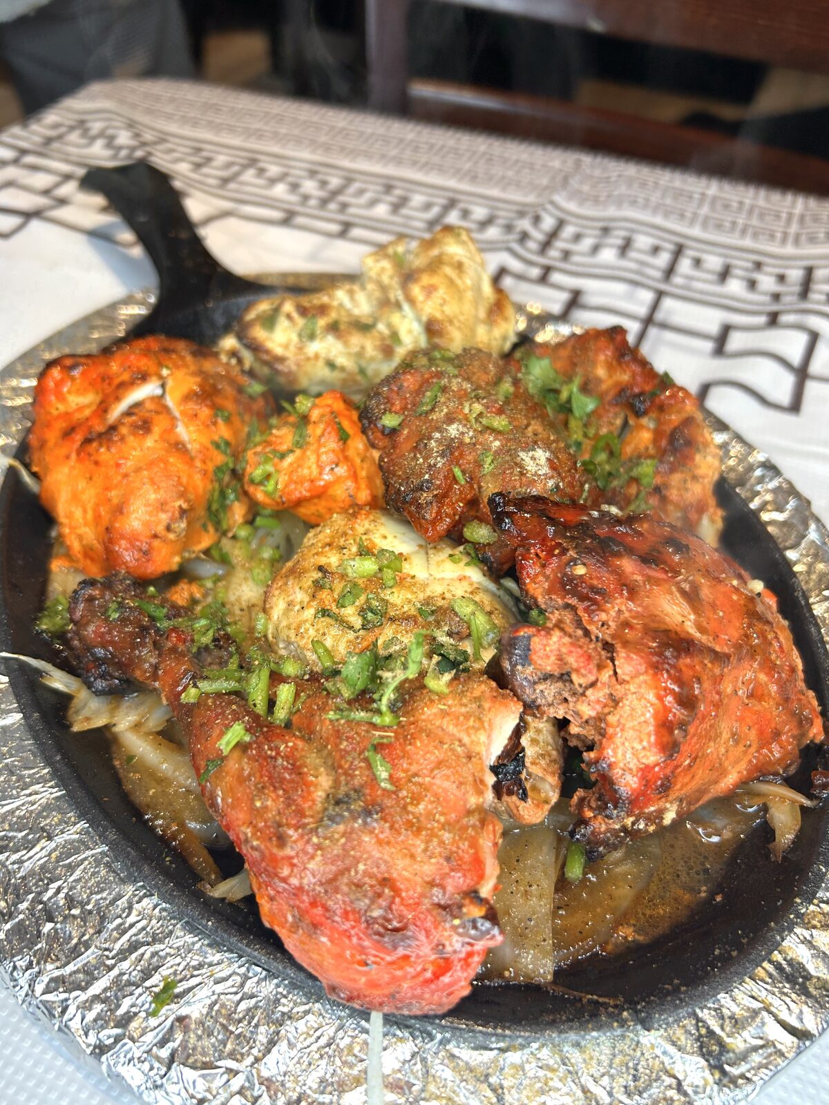 Tandoori mixed grill sizzler with chicken, lamb and kabab
