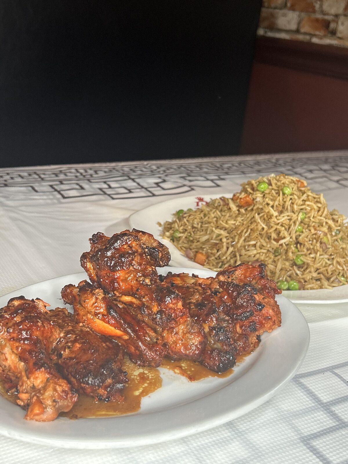 Tandoori chicken paired with Indo-Chinese schezwan fried rice