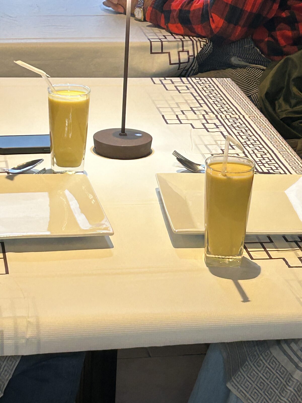 Fresh mango lassi served table-side